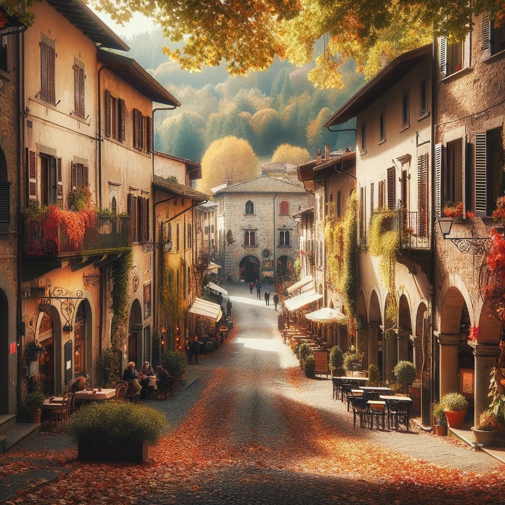 A typical Italian street during autumn, with colorful leaves covering the ground and a quiet atmosphere. Historic buildings on both sides of the street add a rustic charm, and in the distance, you can see a small square with cafes and people enjoying the cool, sunny weather. The image captures the serenity and beauty of Italy outside the high season.
